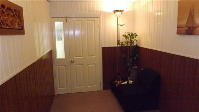 White entrance door to funeral room